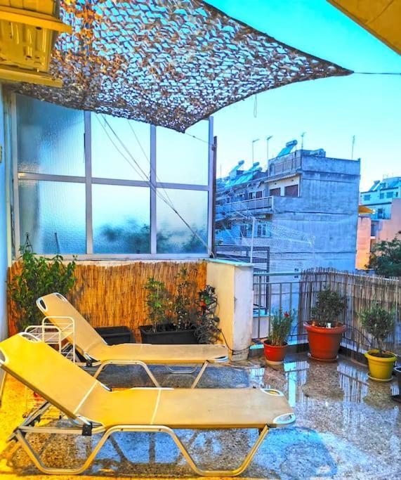 Koukakis Sunshine Roof Apartment Atene Esterno foto